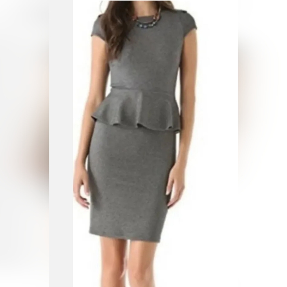 Alice + Olivia black & white stripped peplum dress with scoop back. Size M.